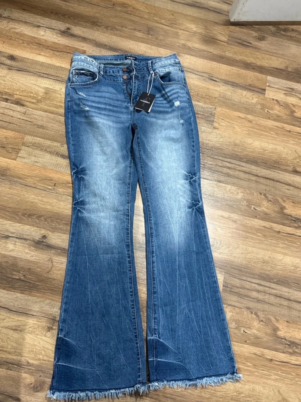 High-Rise Blue Flare Jeans with Frayed Hem